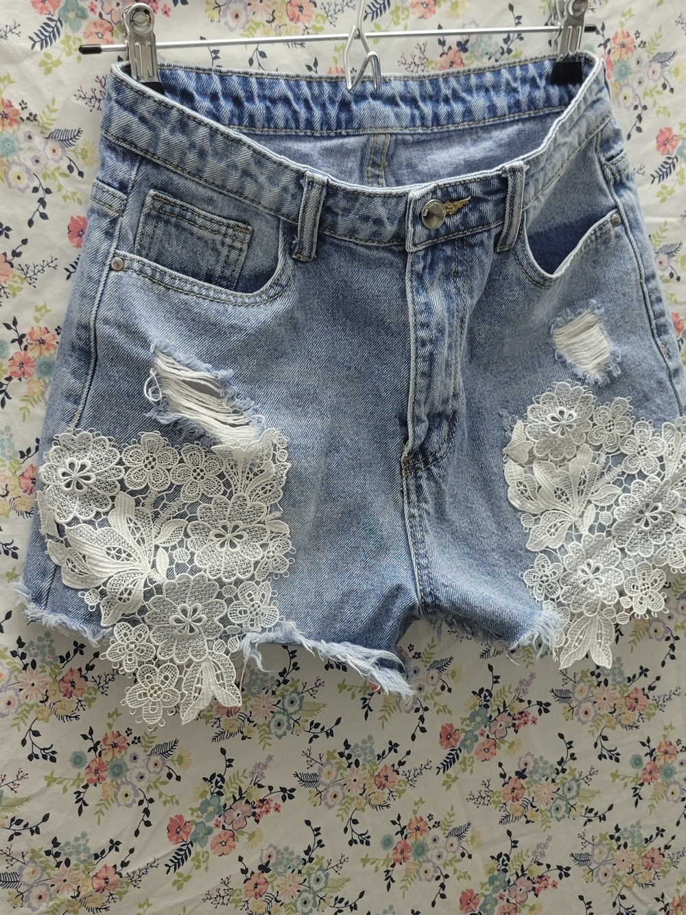 High-Waist Light Blue Denim Shorts with White Lace Appliqué